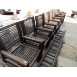 A SET OF EIGHT TEAK GARDEN ARMCHAIRS