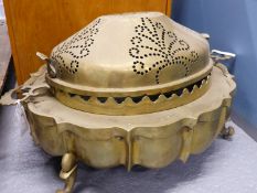 A BRASS TWO HANDLED OVAL BRAZIER AND PIERCED COVER. W 68cms.