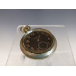 AN H WILLIAMSON 7 JEWEL OPEN FACED POCKET WATCH, THE DENNISON CASE WITH THE WAR DEPT ARROW AND