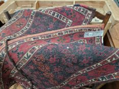 A PAIR OF LARGE BELOUCH SADDLE BAGS, FLAT WOVEN FACES AND BACKS. 120 x 62cms (2)