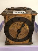 AN EARLY 20th C. SMITHS TIMEPIECE IN A GILT CASE WITH A BRONZE CHAPTER RING