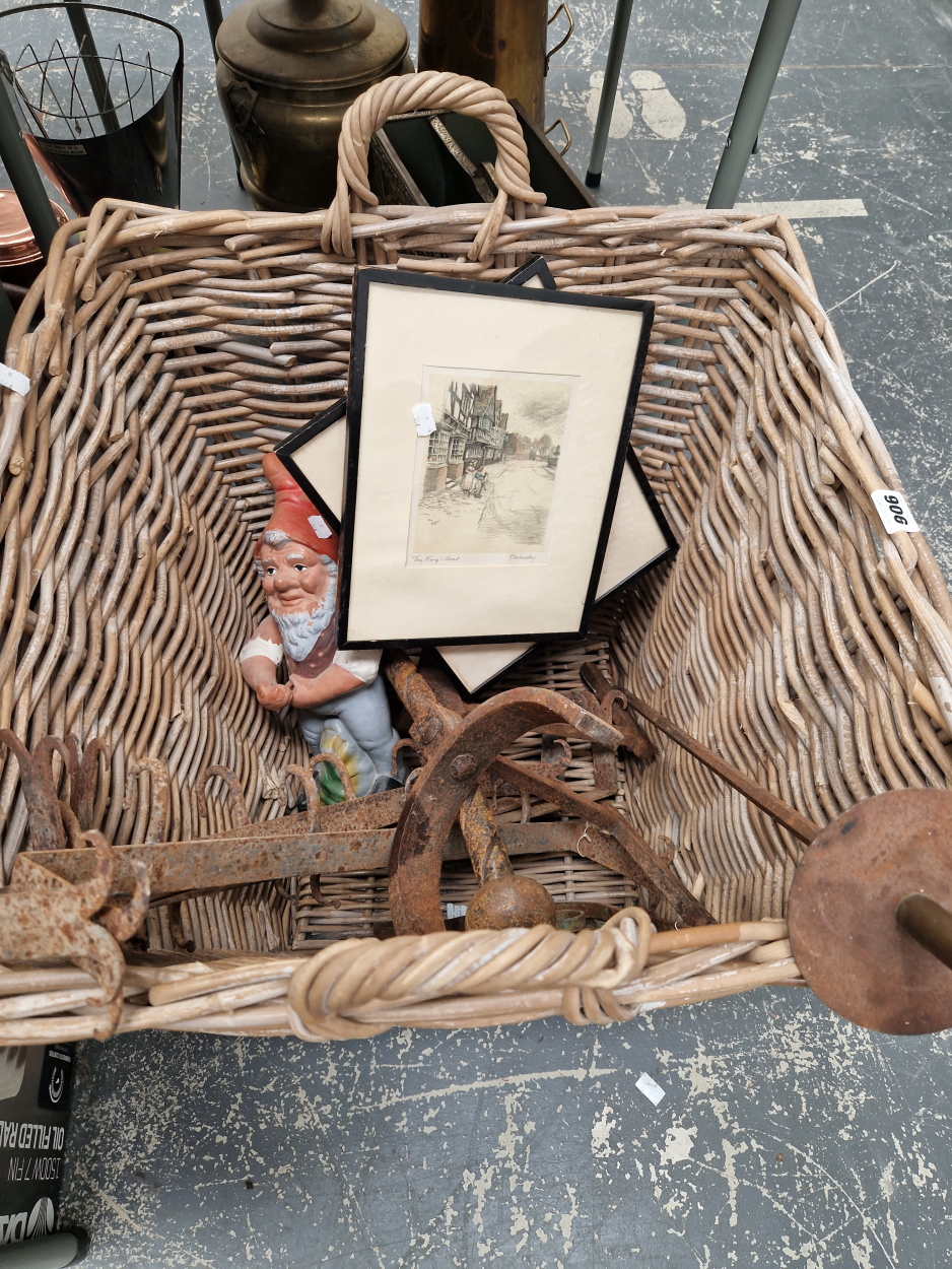 A LARGE LOG BASKET, PAIR OF FIRE DOGS, WROUGHT IRON HOOKS AND A GARDEN GNOME, AND TWO PRINTS