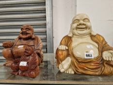 TWO WOODEN AND ANOTHER FIGURE OF BUDAI