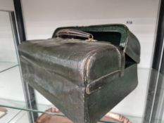 A GREEN LEATHER VANITY CASE