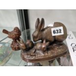 A BRONZE GROUP OF A RABBIT AND TWO YOUNG TOGETHER WITH A COMPOSITION MODEL OF A WREN