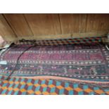 A PAIR OF LARGE BELOUCH SADDLE BAGS, FLAT WOVEN FACES AND BACKS. 126 x 60cms (2)