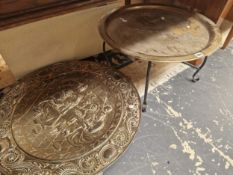 A BRASS TRAY ON STAND AND ONE OTHER