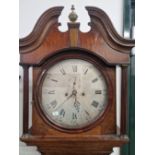 A 19th C. OAK LONG CASED CLOCK, THE CIRCULAR SILVERED DIAL BELOW THE SWAN NECK PEDIMENT WITH