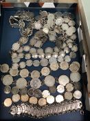 16 SILVER AND OTHER COIN BRACELETS.