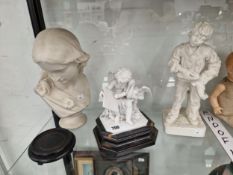 A ROBINSON AND LEADBETTER PARIAN BOOT BOY, A COPELAND PARIAN BUST OF A LADY AND A GERMAN BISQUE BUST