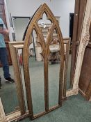 A GOTHIC STYLE WALL MIRROR AND ONE OTHER.