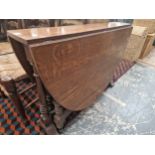 A GOOD QUALITY ANTIQUE OAK LARGE SUTHERLAND TABLE