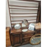 AN UNUSUAL OAK DRESSER