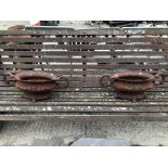 A PAIR OF SMALL CAST IRON CLASSICAL STYLE URNS