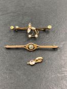 TWO ANTIQUE GEMSET BROOCHES AND A MODERN PENDANT. THE BROOCHES STAMPED 9ct GOLD, THE PENDANT WITH