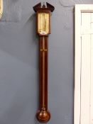 AN AIANO BARBERS POLE BANDED MAHOGANY STICK BAROMETER, THE SILVERED DIAL FLANKED BY A MERCURY