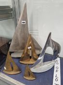 TWO ALUMINIUM MODEL SAILING BOATS TOGETHER WITH THREE OTHERS IN BRASS