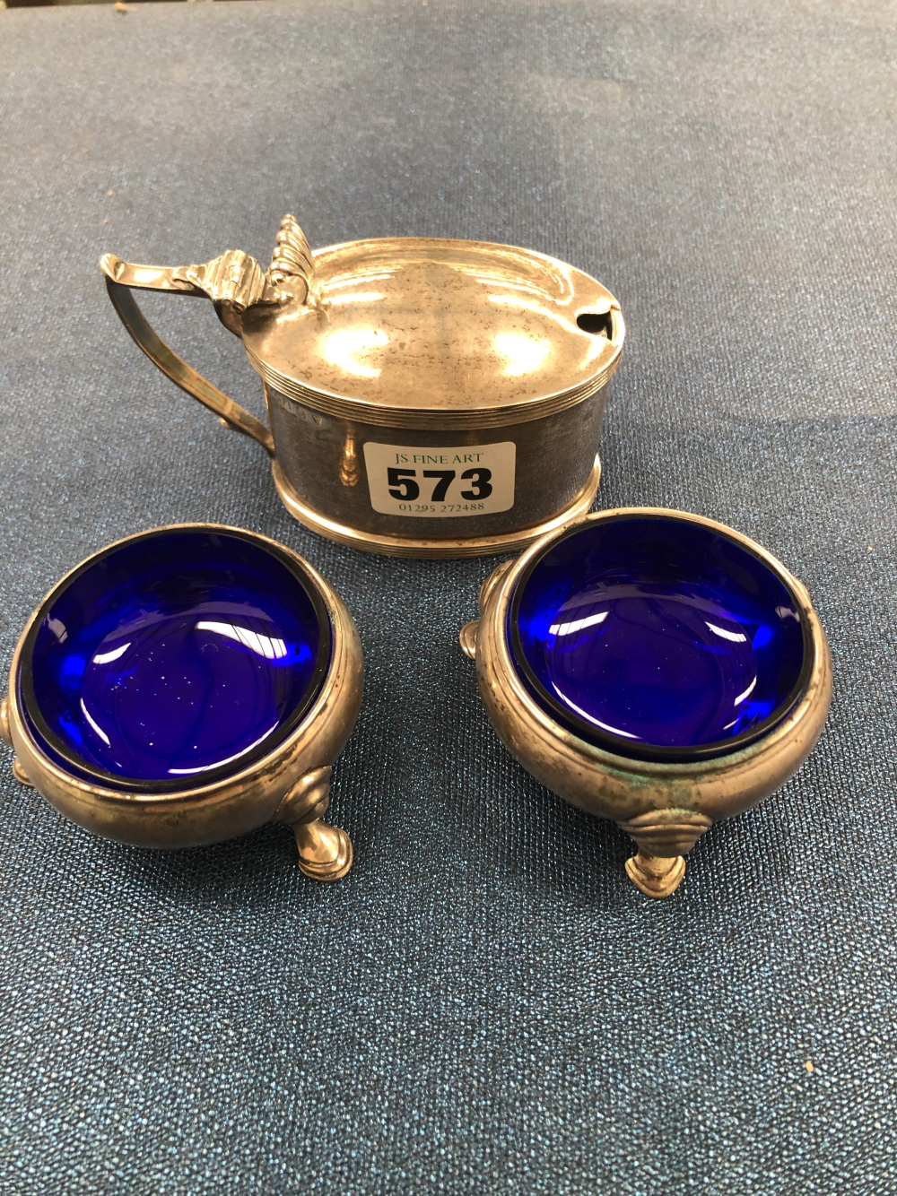 AN EDINBURGH SILVER OVAL DRUM MUSTARD, 1894 TOGETHER WITH A PAIR OF GEORGE III SILVER TRIPOD TUB