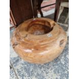 A LARGE TURNED HARDWOOD BOWL.