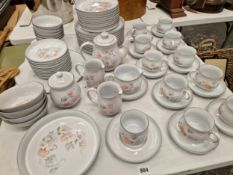 A EXTENSIVE DENBY POTTERY DINNER AND TEA SERVICE.