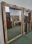 A PAIR OF LATE VICTORIAN PAINTED GESSO FRAMED WALL MIRRORS.