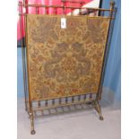 A VICTORIAN BRASS FIRESCREEN WITH A RECTANGULAR SILVER THREAD DAMASK INSET FEATURING DRAGONS AND