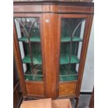 AN EDWARDIAN INLAID DISPLAY CABINET