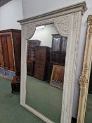 AN IMPRESSIVE PAIR OF LARGE PAINTED FRAME MIRRORS ONE LACKING GLASS.
