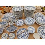 AN ANTIQUE, MEISSEN ONION PATTERN PART DINNER SERVICE BY VARIOUS MAKERS.