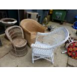 THREE RATTAN CHAIRS AND A GARDEN PARASOL