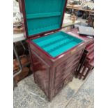 A VINTAGE ORIENTAL STYLE CUTLERY CANTEEN CABINET.