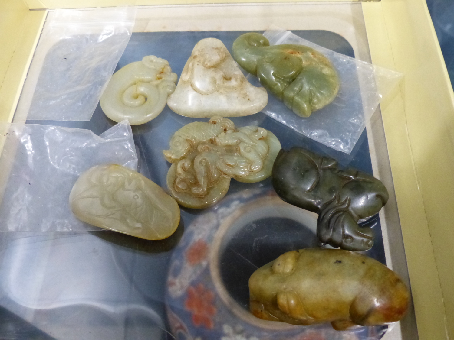 SEVEN CHINESE JADE PENDANTS, EACH CARVED IN ANIMAL FORM, THE LARGEST. W 6.5cms.