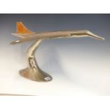 AN ALUMINIUM MODEL OF CONCORDE. W 71cms.