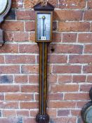 A COMITTI OF HOLBORN LINE INLAID ROSEWOOD STICK BAROMETER WITH AN ALCOHOL THERMOMETER TO ONE SIDE OF