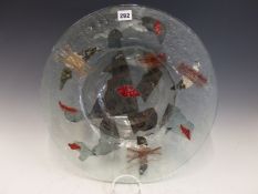 A STUDIO GLASS BOWL, THE CLEAR GLASS WITH PAPER AND TASSELL LIKE INCLUSIONS IN GREY AND RED. Dia.