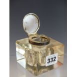 A SILVER MOUNTED SQUARE GLASS INKWELL, LONDON 1897, THE CAP ENGRAVED WITH A MONOGRAM