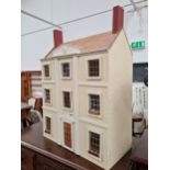 A LARGE DOLLS HOUSE.