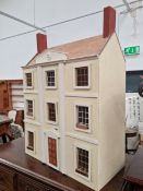 A LARGE DOLLS HOUSE.