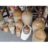 A COLLECTION OF TWO TONE STONE WARE FLASKS AND JARS