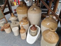 A COLLECTION OF TWO TONE STONE WARE FLASKS AND JARS