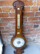 A VICTORIAN ROSEWOOD BANJO BAROMETER WITH A MERCURY THERMOMETER ABOVE THE WHITE CERAMIC DIAL