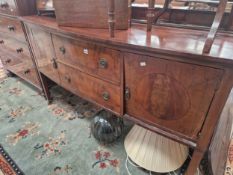 AN ANTIQUE MAHOGANY BOW FRONT SIDE BOARD