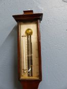 A WILLIAM DUNCAN MAHOGANY STICK BAROMETER, THE SILVERED SCALE FLANKED BY A MERCURY THERMOMETER,