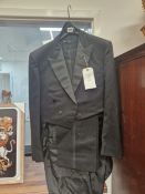 A VINTAGE WALTERS OF OXFORD TAIL COAT SUIT