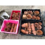 A QUANTITY OF SMALL TERRACOTTA PLANT POTS