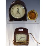 FIVE VARIOUS CLOCKS, TO INCLUDE TWO BY SMITHS IN BAKELITE CASES, ONE BY ANSONIA IN A BRASS CASE