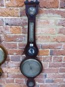 A LINE ILAID MAHOGANY BANJO BAROMETER WITH A MERCURY THERMOMETER ABOVE THE MIRROR, SILVERED DIAL AND