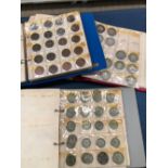 THREE ALBUMS CONTAINING GEORGIAN, VICTORIAN AND LATER SILVER AND COPPER COINS.