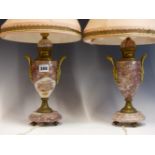 A PAIR OF MOTTLED PINK MARBLE ORMOLU HANDLED BALUSTER TABLE LAMPS