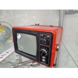 A VEGA 542 RED CASED MINIATURE TELEVISION